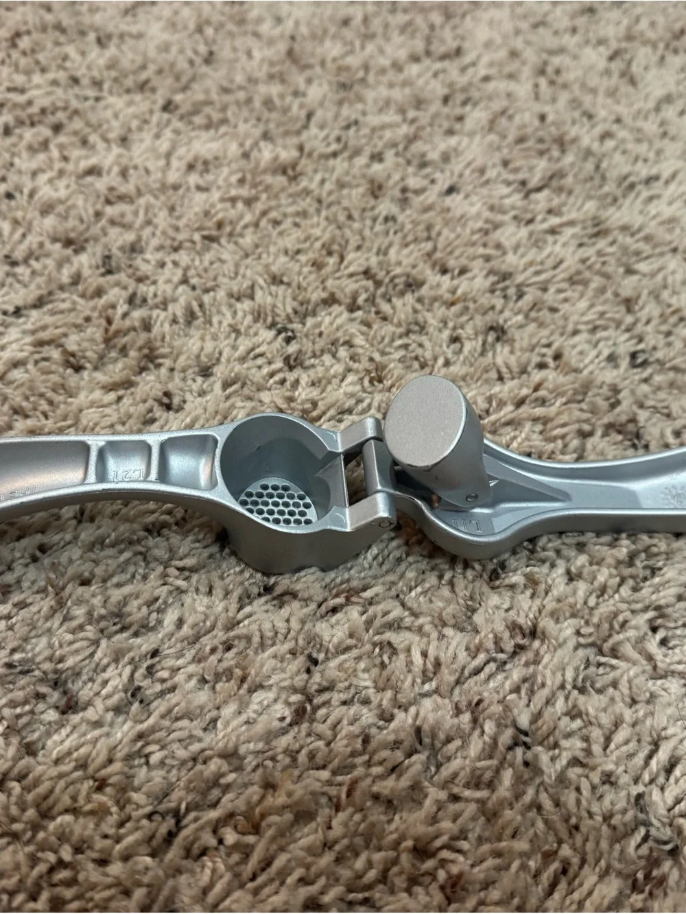 The Pampered Chef Garlic Press